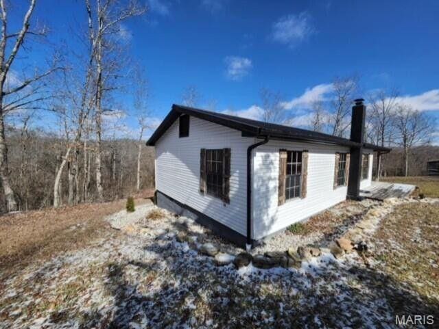 11498 M-Weatherman Dr, Mountain Grove, MO 65711 - view of side of property with a chimney