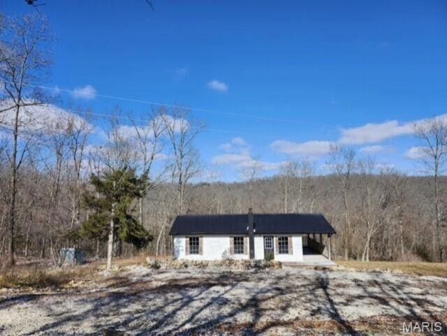 11498 M-Weatherman Dr, Mountain Grove, MO 65711 - ranch-style home with a forest view