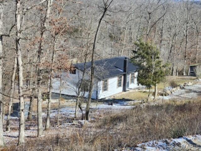 11498 M-Weatherman Dr, Mountain Grove, MO 65711 - view of home's exterior featuring a forest view