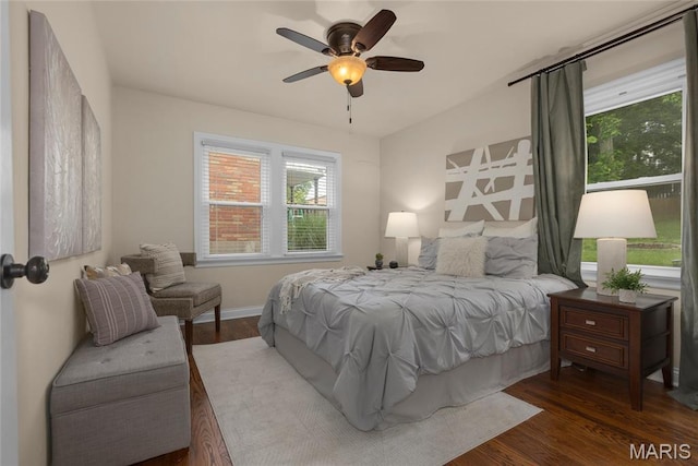 7603 Devonshire Ave, Shrewsbury, MO 63119 - bedroom featuring wood finished floors, baseboards, and ceiling fan