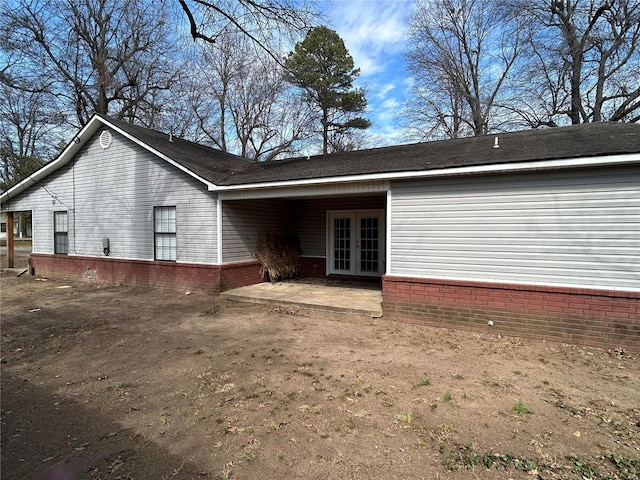 404 N Everett St, Kennett, MO 63857 - back of house featuring french doors and a patio area