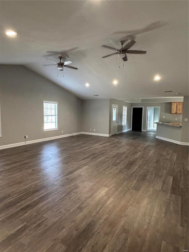 404 N Everett St, Kennett, MO 63857 - unfurnished living room with a ceiling fan, vaulted ceiling, baseboards, and recessed lighting