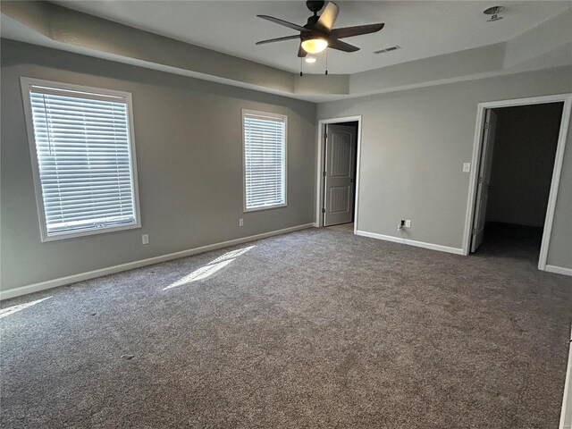 404 N Everett St, Kennett, MO 63857 - unfurnished bedroom with carpet floors, baseboards, and multiple windows