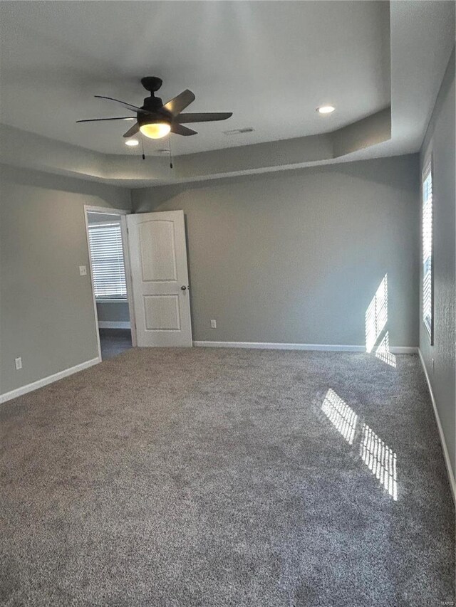 404 N Everett St, Kennett, MO 63857 - carpeted spare room with a ceiling fan and baseboards