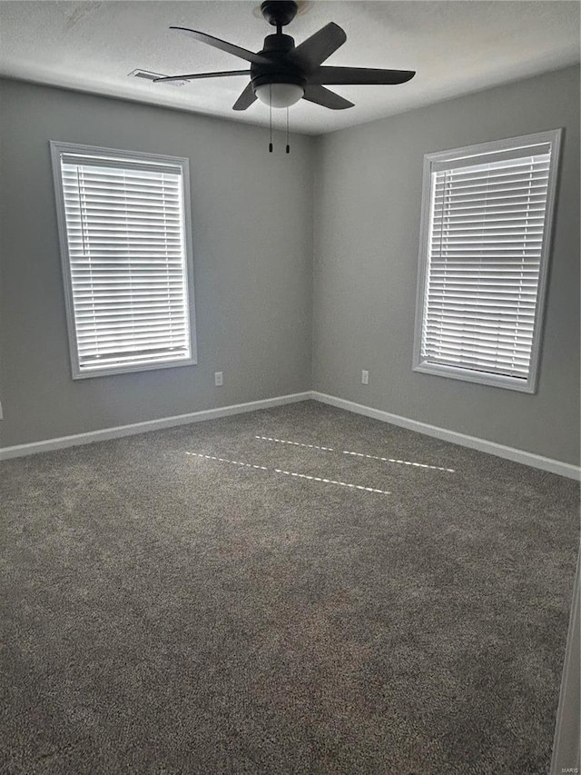 404 N Everett St, Kennett, MO 63857 - carpeted spare room featuring ceiling fan and baseboards