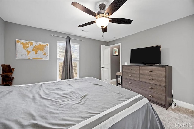 4028 Montague Cir Unit 4, Saint Charles, MO 63304 - bedroom featuring baseboards, carpet, and ceiling fan