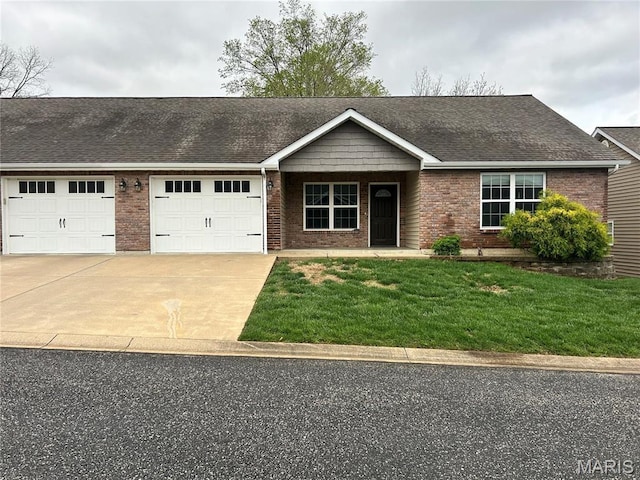 40 Pecan Tree Ln, Farmington, MO 63640 - ranch-style house featuring brick siding, a garage, concrete driveway, and a front lawn