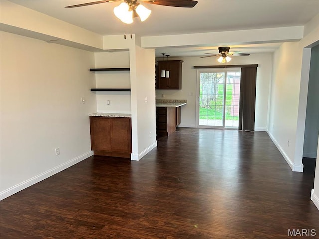 40 Pecan Tree Ln, Farmington, MO 63640 - unfurnished living room featuring a ceiling fan, dark wood-style floors, and baseboards