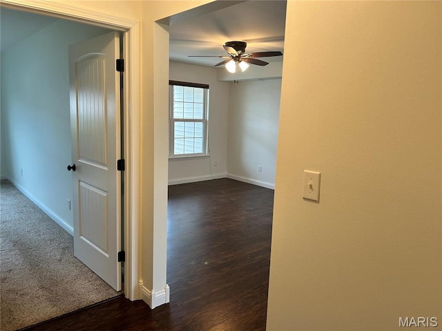 40 Pecan Tree Ln, Farmington, MO 63640 - empty room featuring a ceiling fan, baseboards, and dark wood-style floors