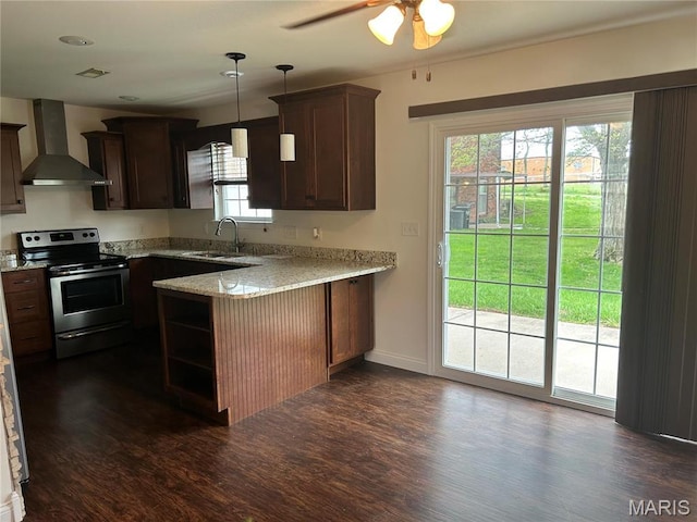 40 Pecan Tree Ln, Farmington, MO 63640 - kitchen featuring wall chimney exhaust hood, stainless steel range with electric cooktop, dark wood-style flooring, and a peninsula