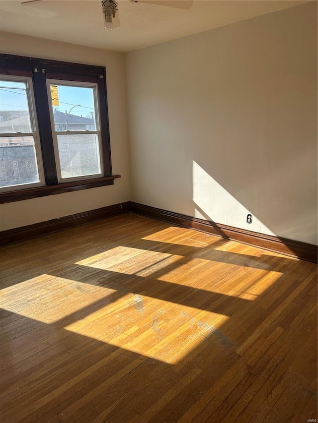 3923 Gravois Ave, Saint Louis, MO 63116 - spare room featuring wood finished floors and baseboards