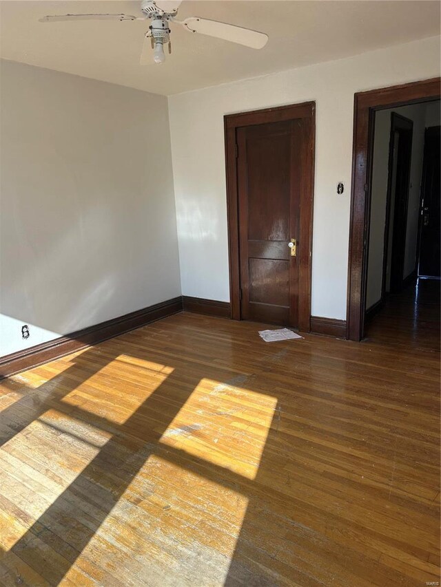 3923 Gravois Ave, Saint Louis, MO 63116 - spare room with a ceiling fan, baseboards, and wood finished floors