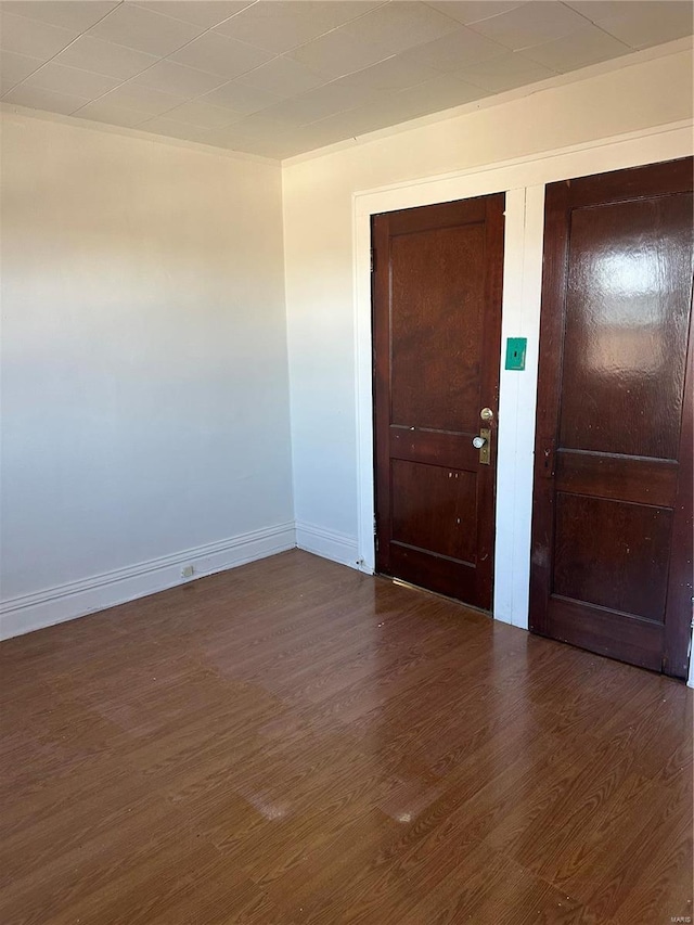 3923 Gravois Ave, Saint Louis, MO 63116 - spare room featuring wood finished floors and baseboards