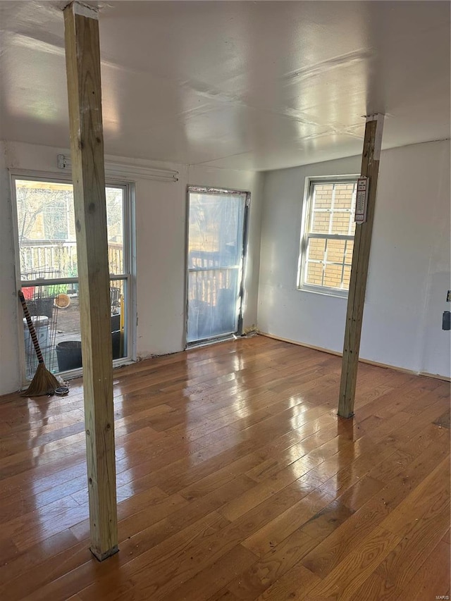3923 Gravois Ave, Saint Louis, MO 63116 - empty room featuring wood-type flooring and plenty of natural light
