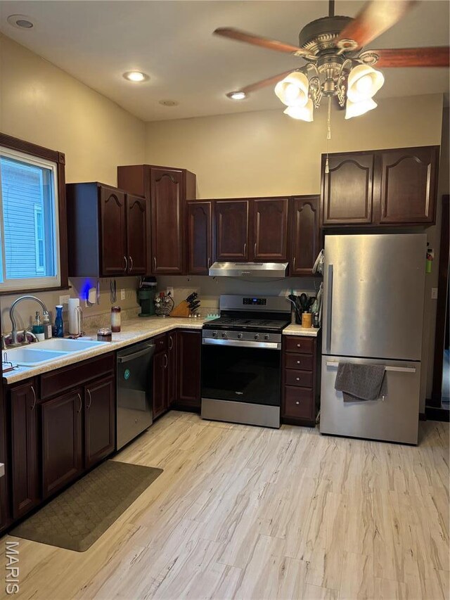 911 Grand Ave, Edwardsville, IL 62025 - kitchen with appliances with stainless steel finishes, a sink, light countertops, ceiling fan, and dark brown cabinets