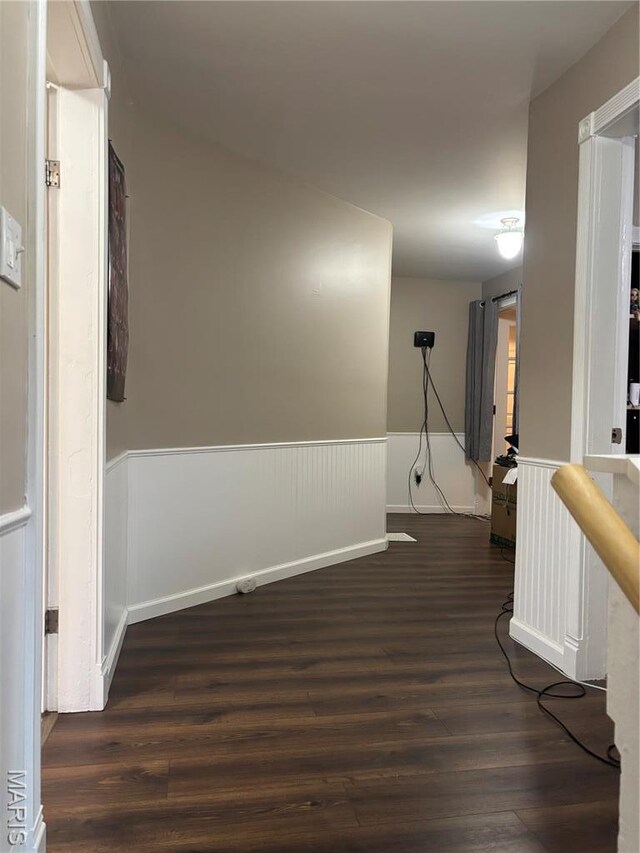911 Grand Ave, Edwardsville, IL 62025 - corridor with a wainscoted wall, dark wood-type flooring, and an upstairs landing