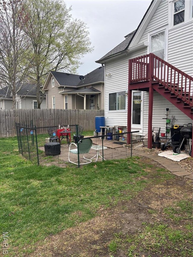 911 Grand Ave, Edwardsville, IL 62025 - back of house with a patio
