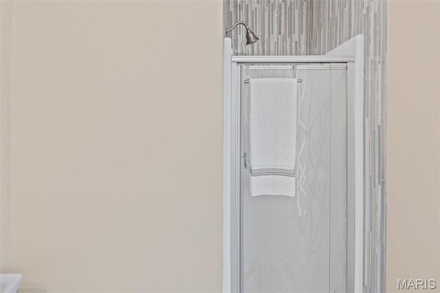 911 Grand Ave, Edwardsville, IL 62025 - bathroom view of a marble finish shower