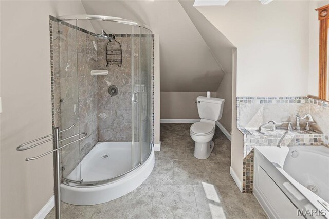 911 Grand Ave, Edwardsville, IL 62025 - full bath featuring a shower stall, toilet, a garden tub, and baseboards