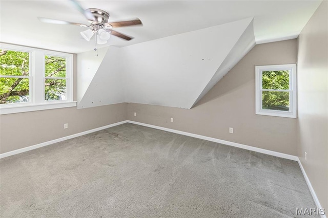 911 Grand Ave, Edwardsville, IL 62025 - additional living space with a ceiling fan, baseboards, lofted ceiling, and carpet