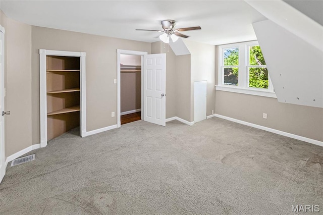911 Grand Ave, Edwardsville, IL 62025 - unfurnished bedroom featuring carpet flooring, baseboards, and ceiling fan