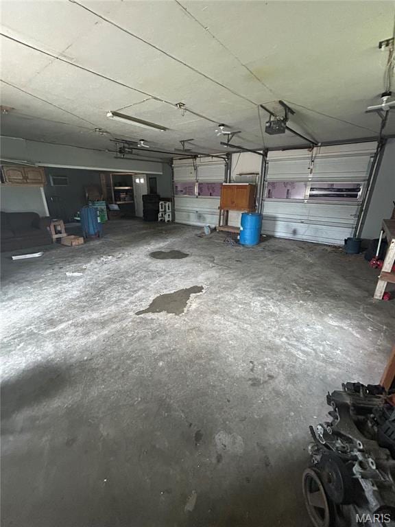 308 N Broadwater St, New Florence, MO 63363 - garage featuring a garage door opener