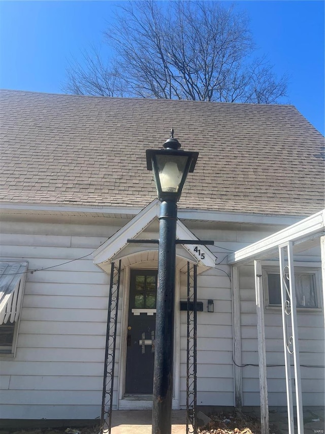 exterior view of roof with shingles