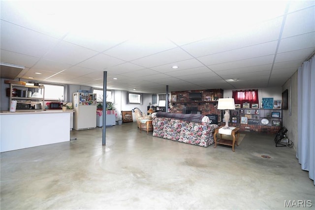 134 Pine St, Farmington, MO 63640 - living room with finished concrete floors and a drop ceiling