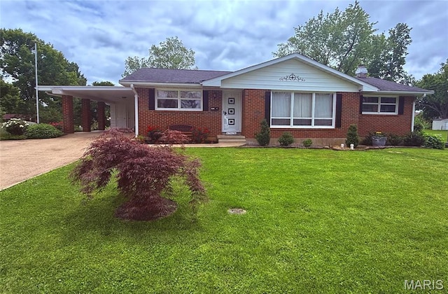 134 Pine St, Farmington, MO 63640 - view of front of home featuring driveway, brick siding, an attached carport, and a front yard
