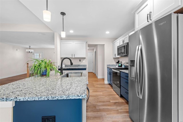 948 Half Moon, Caseyville, IL 62232 - kitchen featuring appliances with stainless steel finishes, a sink, baseboards, white cabinetry, and recessed lighting