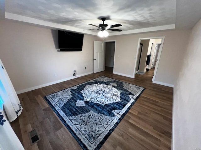 948 Half Moon, Caseyville, IL 62232 - bedroom with baseboards, wood finished floors, a tray ceiling, and a ceiling fan