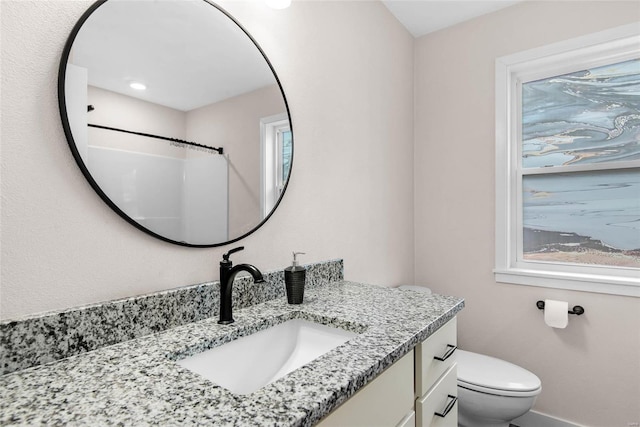 948 Half Moon, Caseyville, IL 62232 - bathroom featuring vanity, toilet, healthy amount of natural light, and baseboards