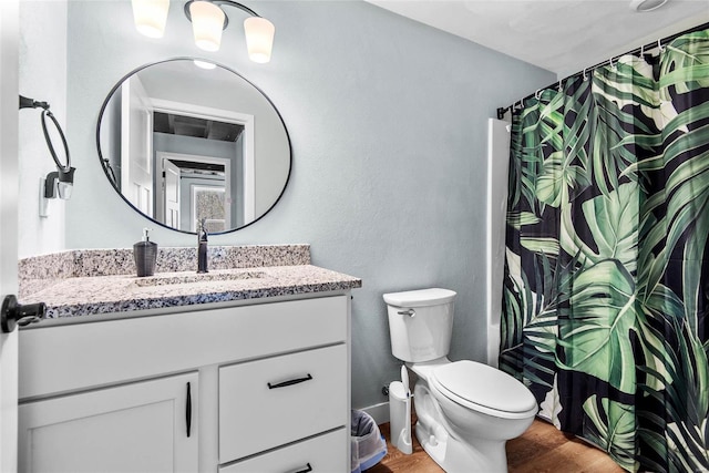 948 Half Moon, Caseyville, IL 62232 - bathroom featuring wood finished floors, toilet, vanity, and a shower with shower curtain