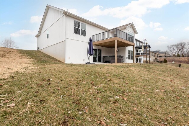 948 Half Moon, Caseyville, IL 62232 - rear view of house with a covered hot tub, a deck, and a lawn