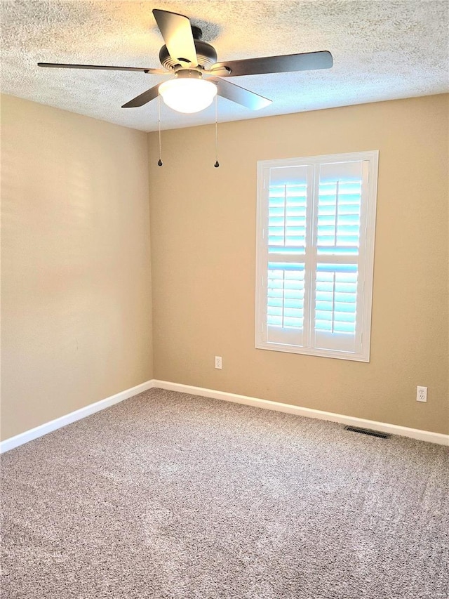 15872 Tundra St, Saint Robert, MO 65584 - unfurnished room with a ceiling fan, carpet floors, a textured ceiling, and baseboards
