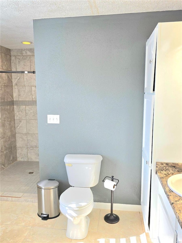 15872 Tundra St, Saint Robert, MO 65584 - full bathroom featuring tiled shower, toilet, baseboards, and tile patterned flooring