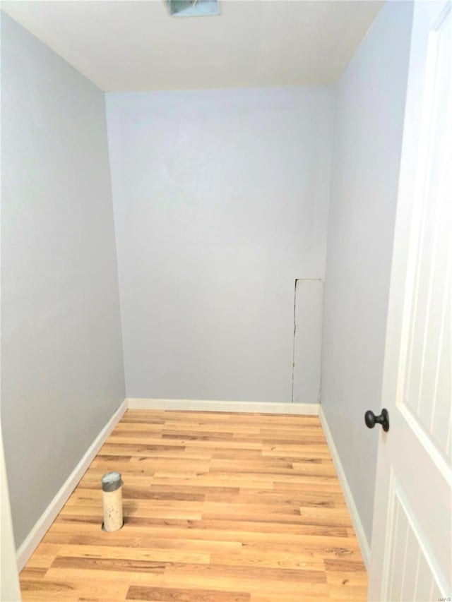 15872 Tundra St, Saint Robert, MO 65584 - empty room featuring light wood-style floors and baseboards