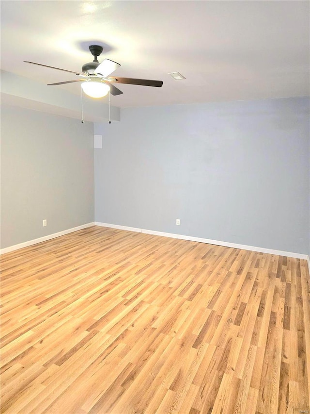 15872 Tundra St, Saint Robert, MO 65584 - empty room featuring ceiling fan, light wood-style flooring, and baseboards
