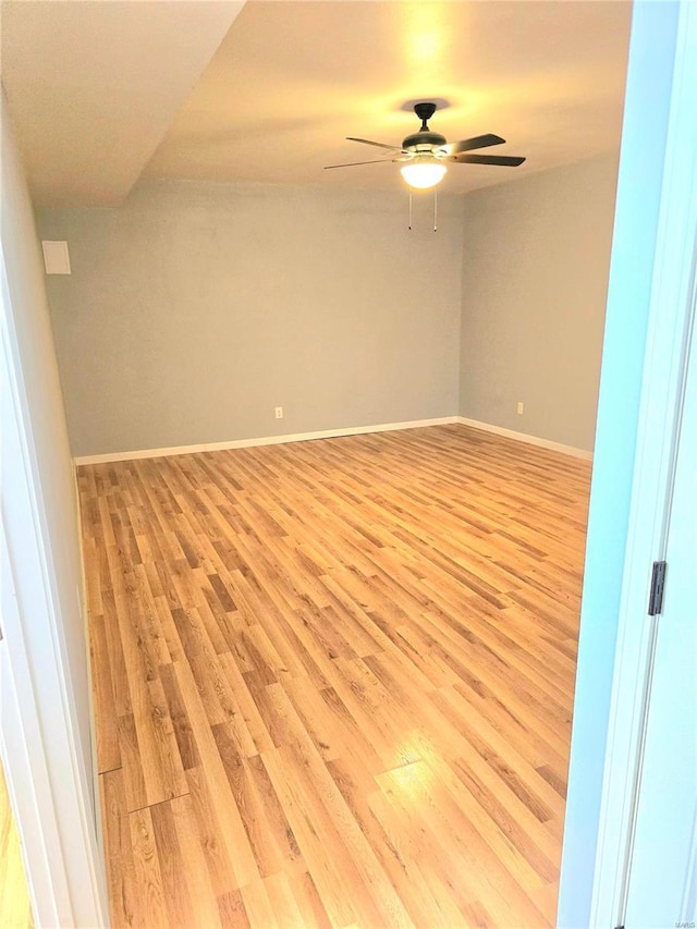 15872 Tundra St, Saint Robert, MO 65584 - empty room with light wood-type flooring, ceiling fan, and baseboards