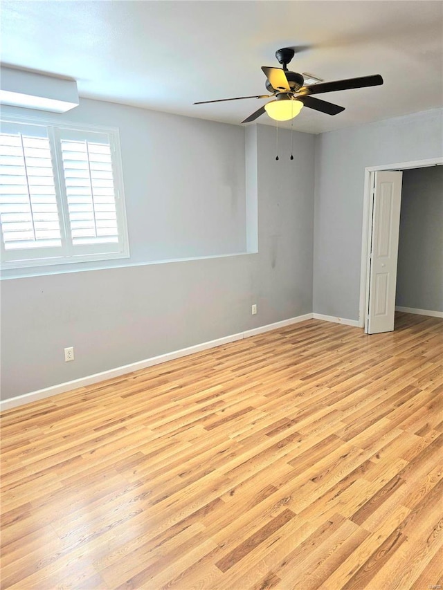 15872 Tundra St, Saint Robert, MO 65584 - spare room with light wood-style floors, a ceiling fan, and baseboards