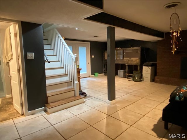 207 Navaho Dr, Cape Girardeau, MO 63701 - basement featuring stairs and tile patterned flooring
