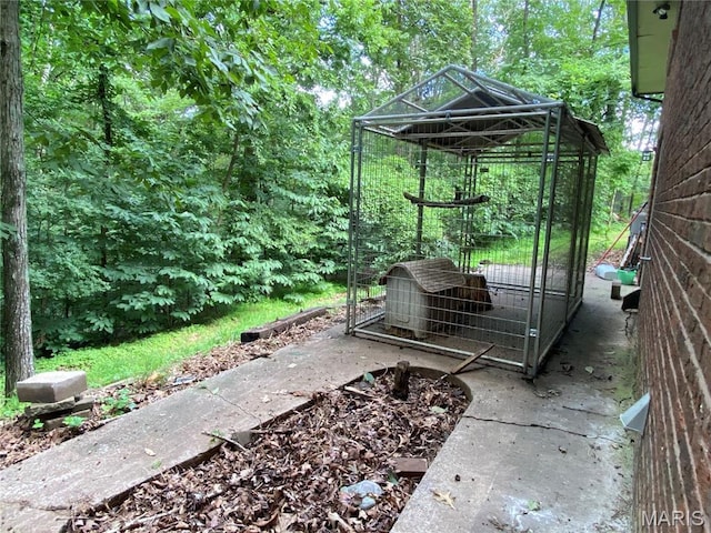 207 Navaho Dr, Cape Girardeau, MO 63701 - view of patio featuring an outbuilding