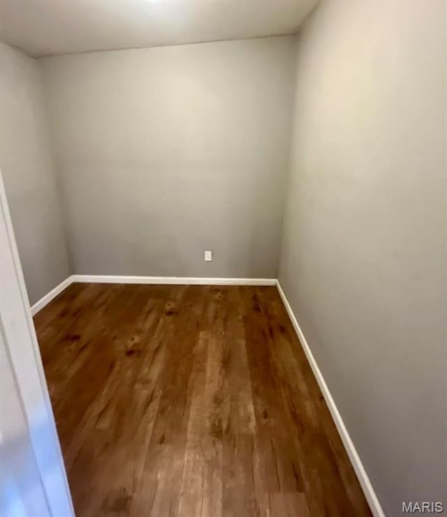 750 Robinwood Dr, Florissant, MO 63033 - unfurnished room featuring wood finished floors and baseboards