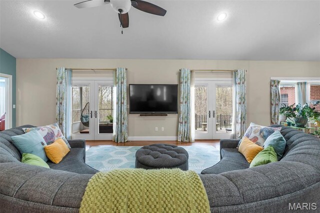 149 Windy Point Ave, Cape Girardeau, MO 63701 - living room featuring french doors, plenty of natural light, wood finished floors, and recessed lighting
