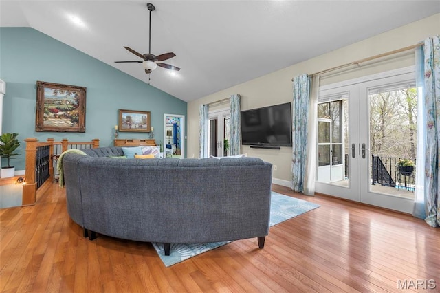 149 Windy Point Ave, Cape Girardeau, MO 63701 - living area with vaulted ceiling, french doors, light wood-type flooring, a ceiling fan, and baseboards