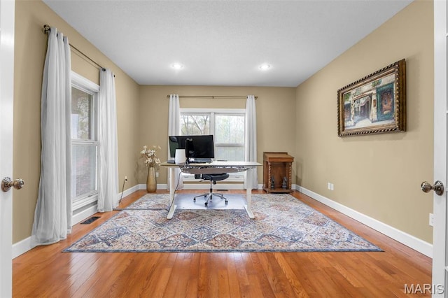 149 Windy Point Ave, Cape Girardeau, MO 63701 - home office featuring baseboards, wood finished floors, and recessed lighting