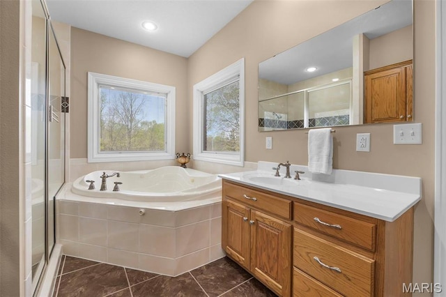 149 Windy Point Ave, Cape Girardeau, MO 63701 - full bathroom with a stall shower, a garden tub, and vanity