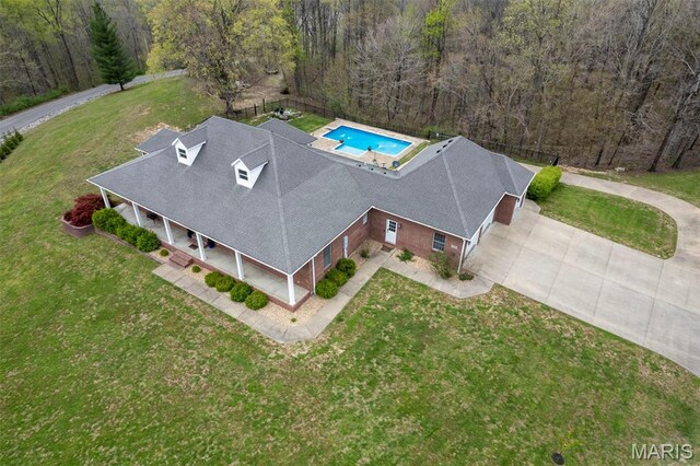 149 Windy Point Ave, Cape Girardeau, MO 63701 - aerial view of property and surrounding area with a pool area and a heavily wooded area