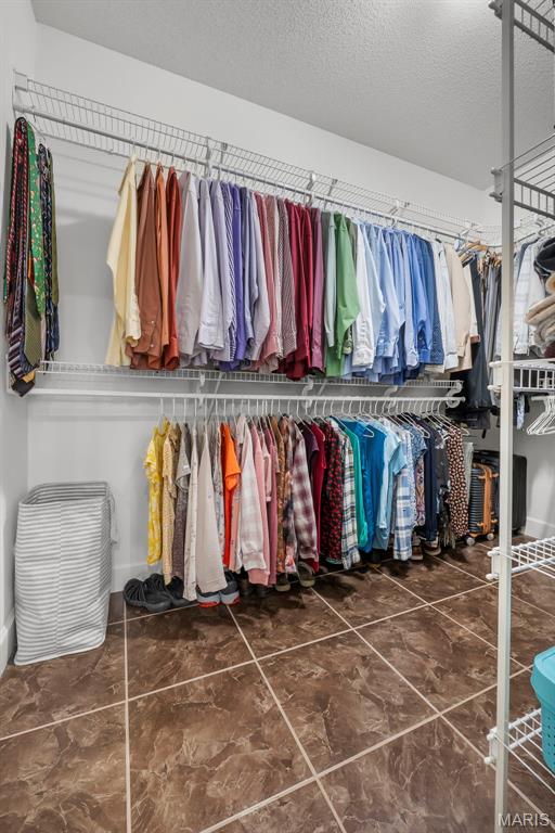 149 Windy Point Ave, Cape Girardeau, MO 63701 - walk in closet with tile patterned flooring