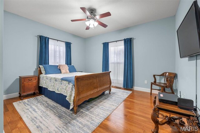 149 Windy Point Ave, Cape Girardeau, MO 63701 - bedroom featuring light wood-style floors, baseboards, and a ceiling fan